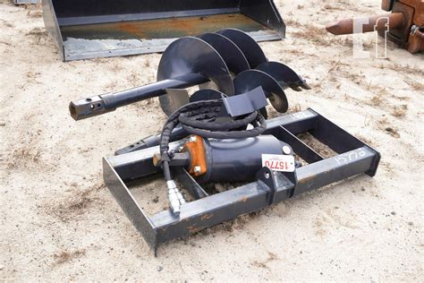 wolverine skid steer auger|skid steer tiller wolverine attachment.